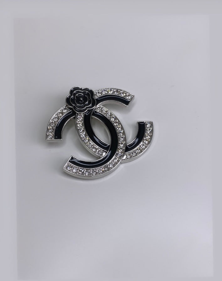 Broche charme argent et noir